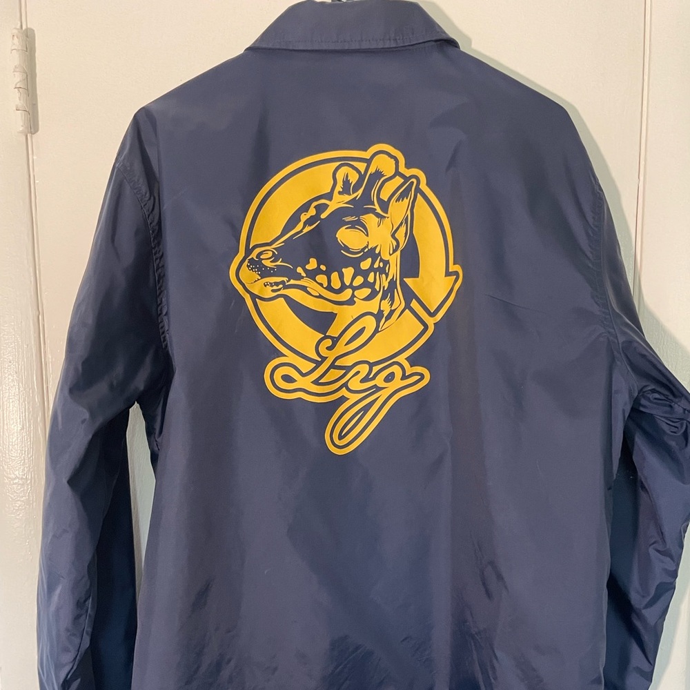 Lifted Research Group (LRG) lightweightWindbreaker jacket. Blue and Yellow.